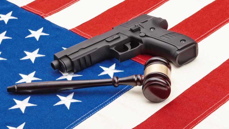 Gun, gavel. and American flag