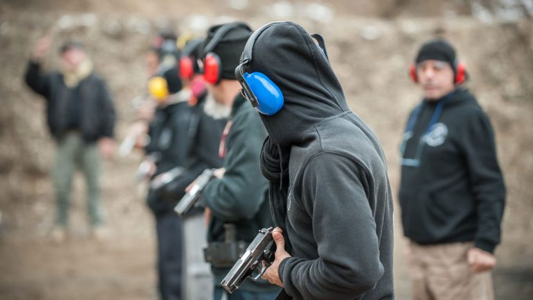 An image showing a group engaged in firearms training.