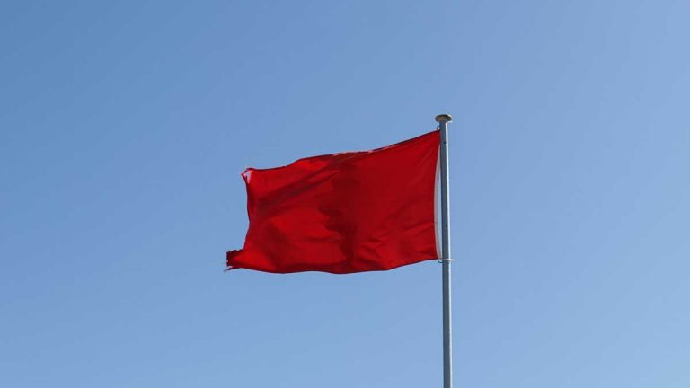 An image of a red flag.