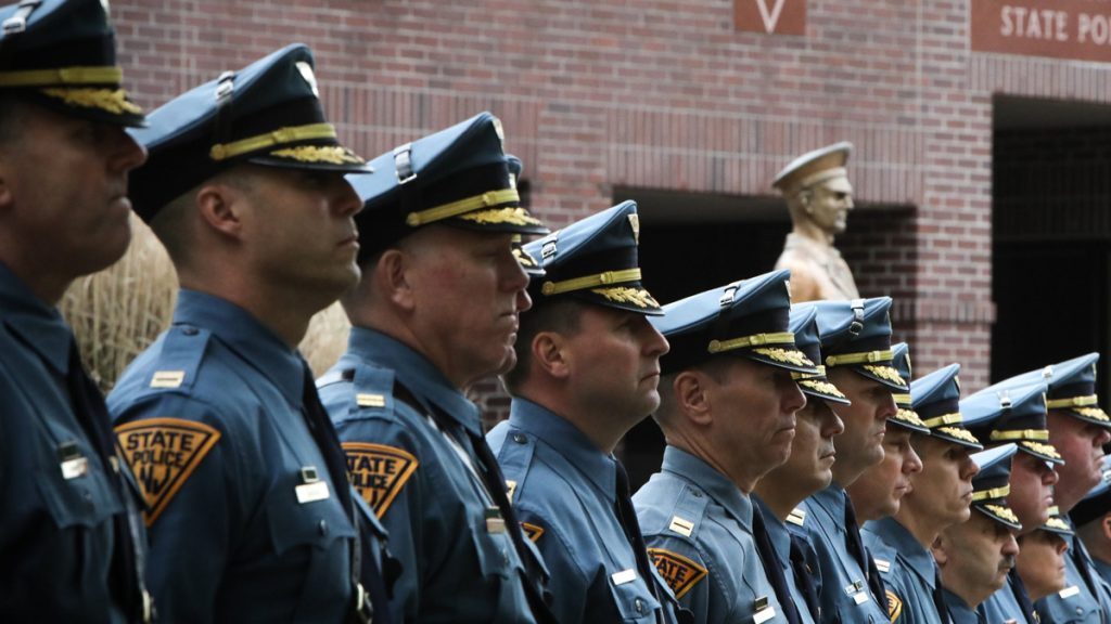 New Jersey State Troopers standing in front of the New Jersey State Police Museum