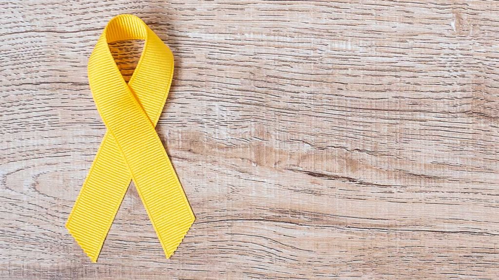 A yellow ribbon which represents suicide prevention