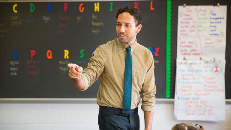 A teacher, possibly carrying a concealed firearm.