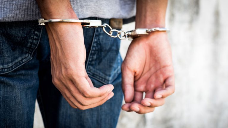 A person in handcuffs