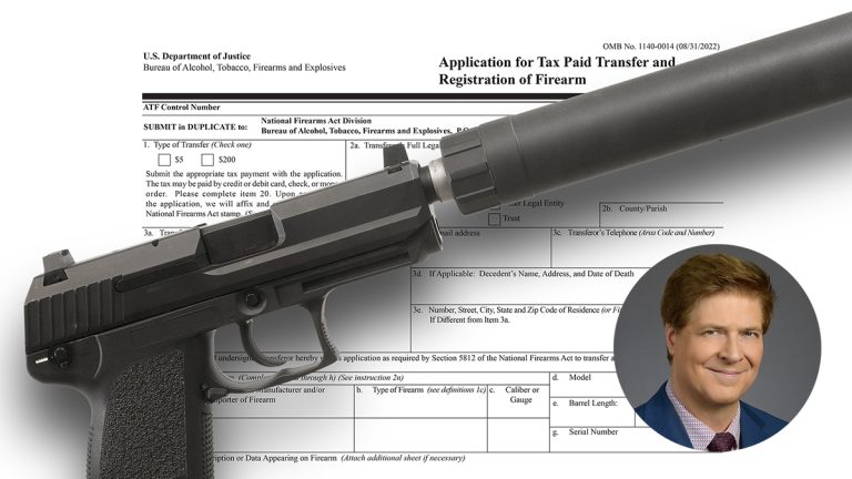 A pistol with a silencer sitting atop an ATF form