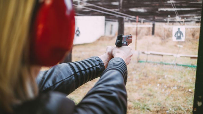Woman training with a firearm