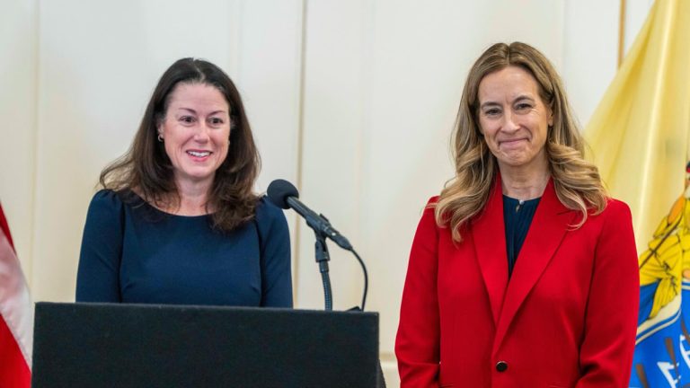 From left to right, New Jersey Acting Attorney General Jennifer Davenport and Governor Mikie Sherill.