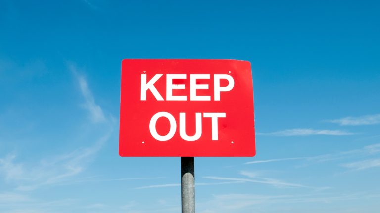 A sign that says 'keep out'