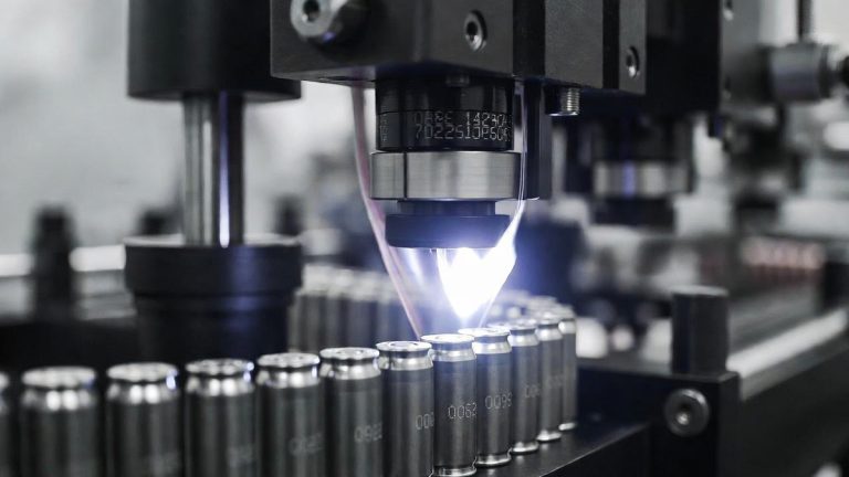 A machine serializing ammunition