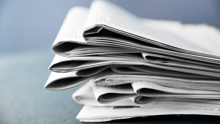 A stack of newspapers