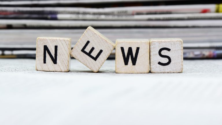 Some scrabble tiles that say 'news'