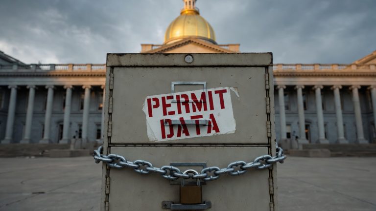 A locked filing cabinet containing permit data