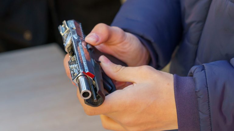 Person holding a handgun