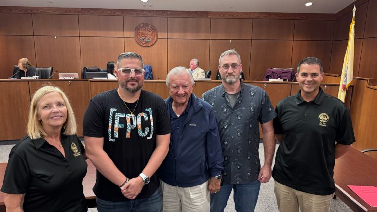 Englishtown Mayor Daniel Francisco, pictured second from left, Point Pleasant Mayor Robert Sabosik, pictured center, and Grassroots Second Amendment Activist Tony Rockhill, fourth from left, and members of the Point Pleasant council.
